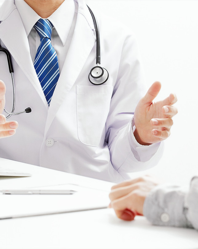 Arzt im Patientengespräch